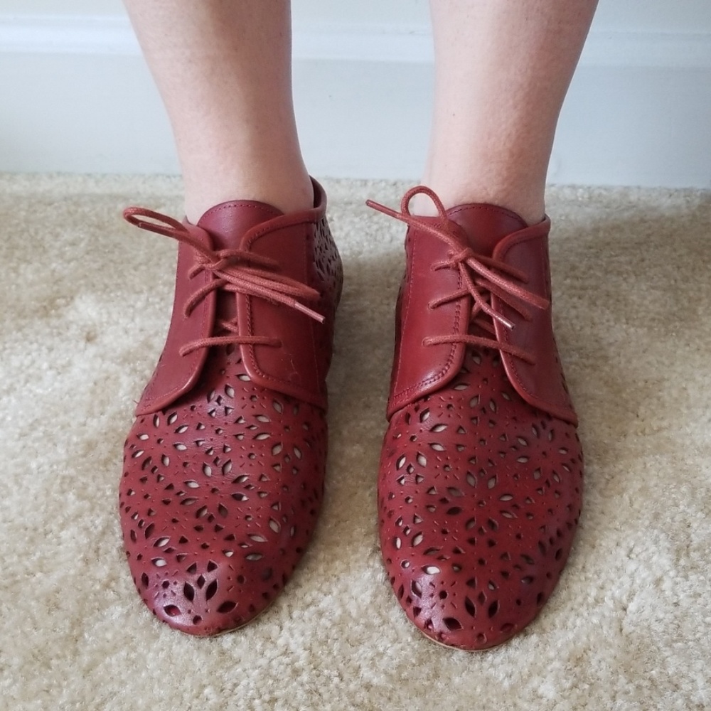 Sixy Seven Leather Cutout Lace up booties.